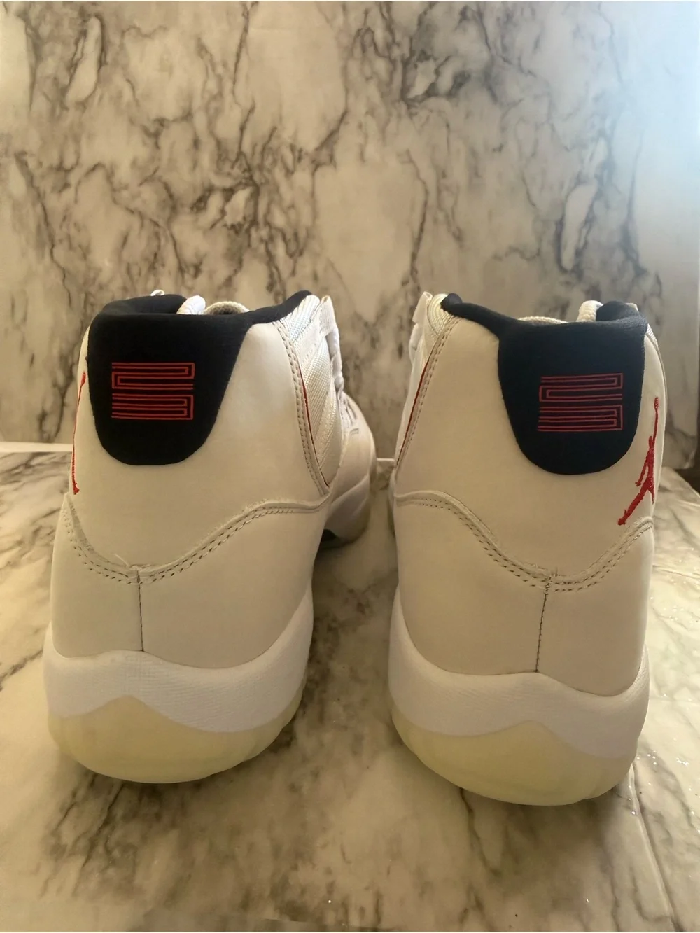 NEW Air Jordan 11 Retro in Platinum Tint and University Red